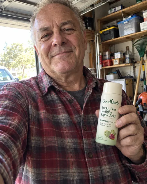 GoodHerb customer holding the bottle
